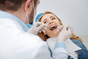 Woman receiving dental treatment