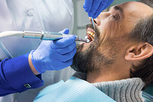 Man receiving dental treatment