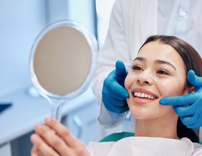 a patient visiting her dentist for a checkup and cleaning