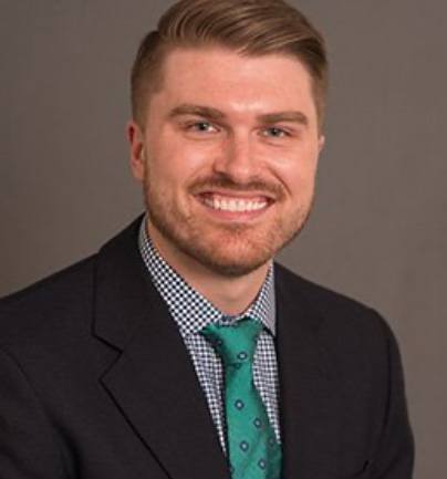 headshot of Dr. Nicholas M. Guy