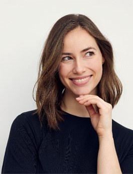 Woman in black shirt smiling