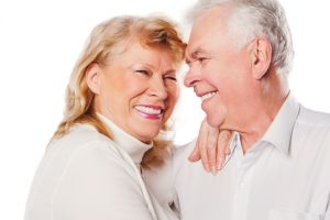 Older man and woman smiling